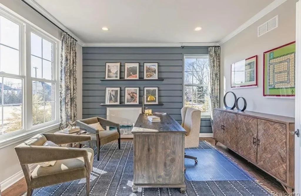 Choosing the Right Paint: Understanding Formulas and Finishes 4 a room with a desk and chairs