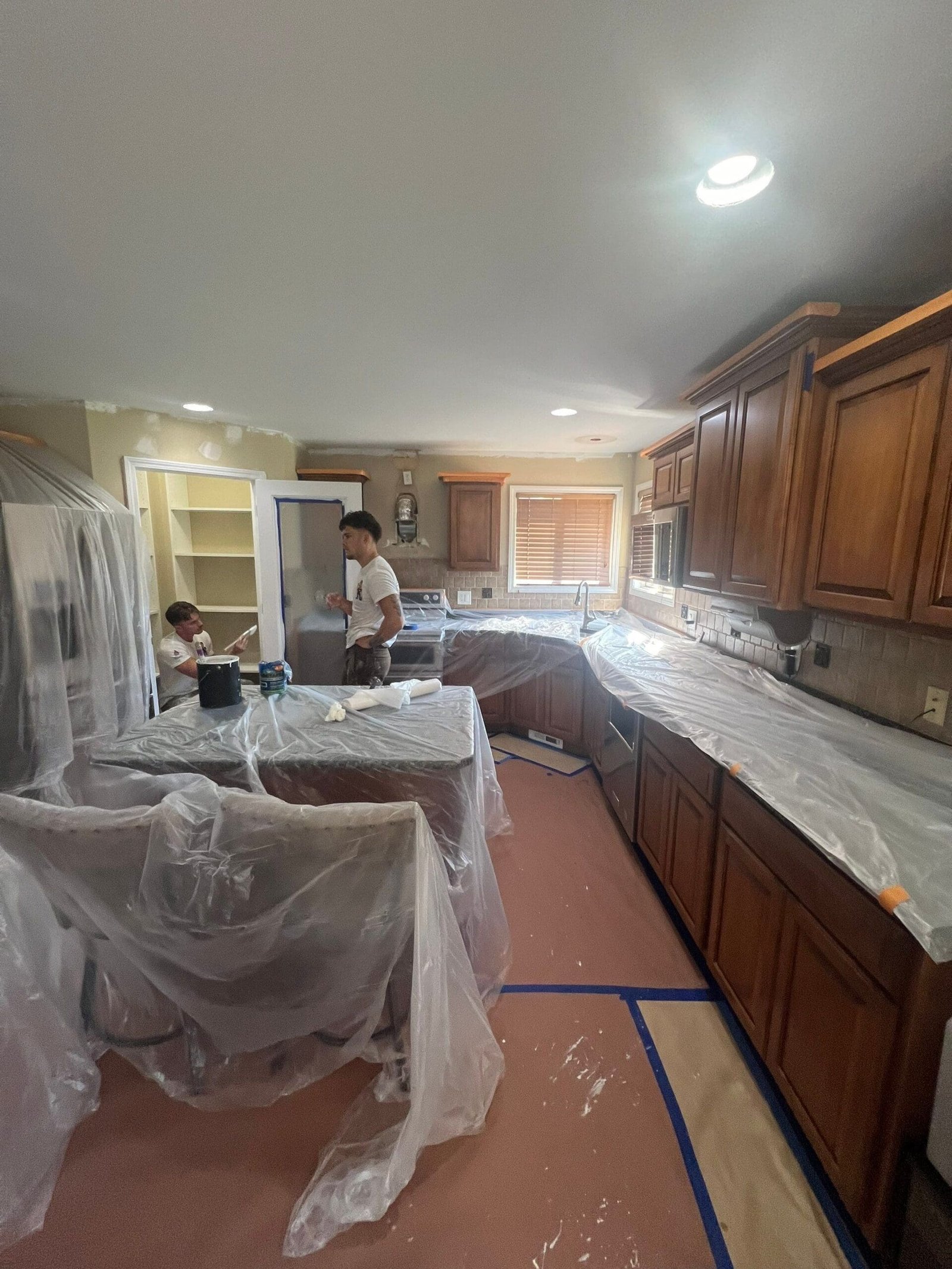 a cabinets covered in plastic
