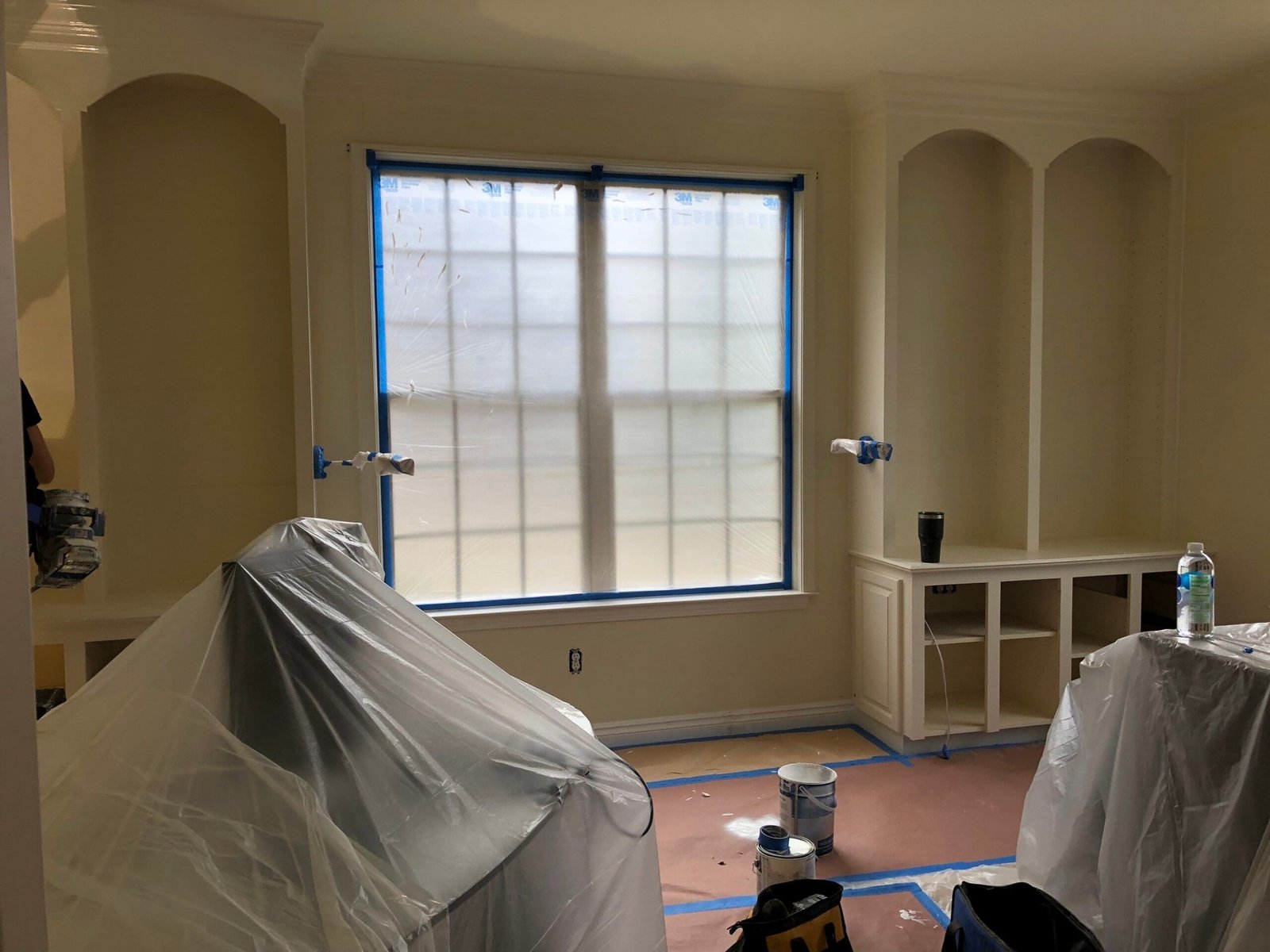 a couch covered in plastic