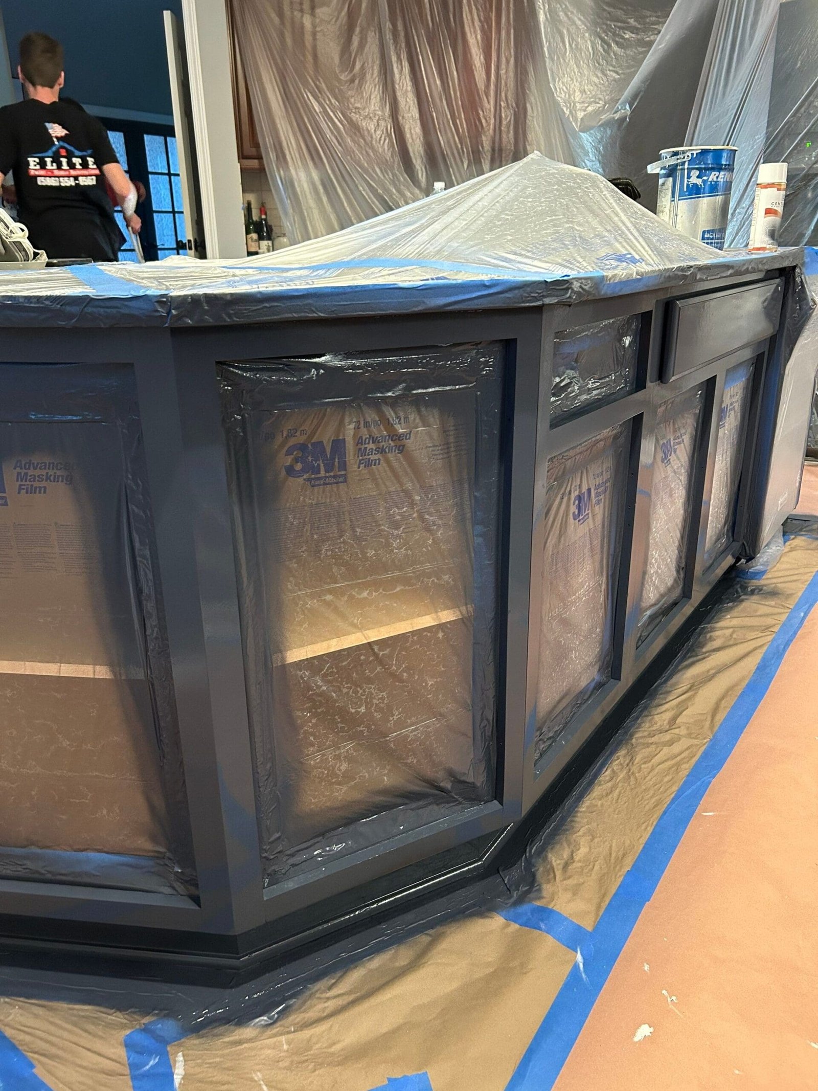 a cabinets covered in plastic