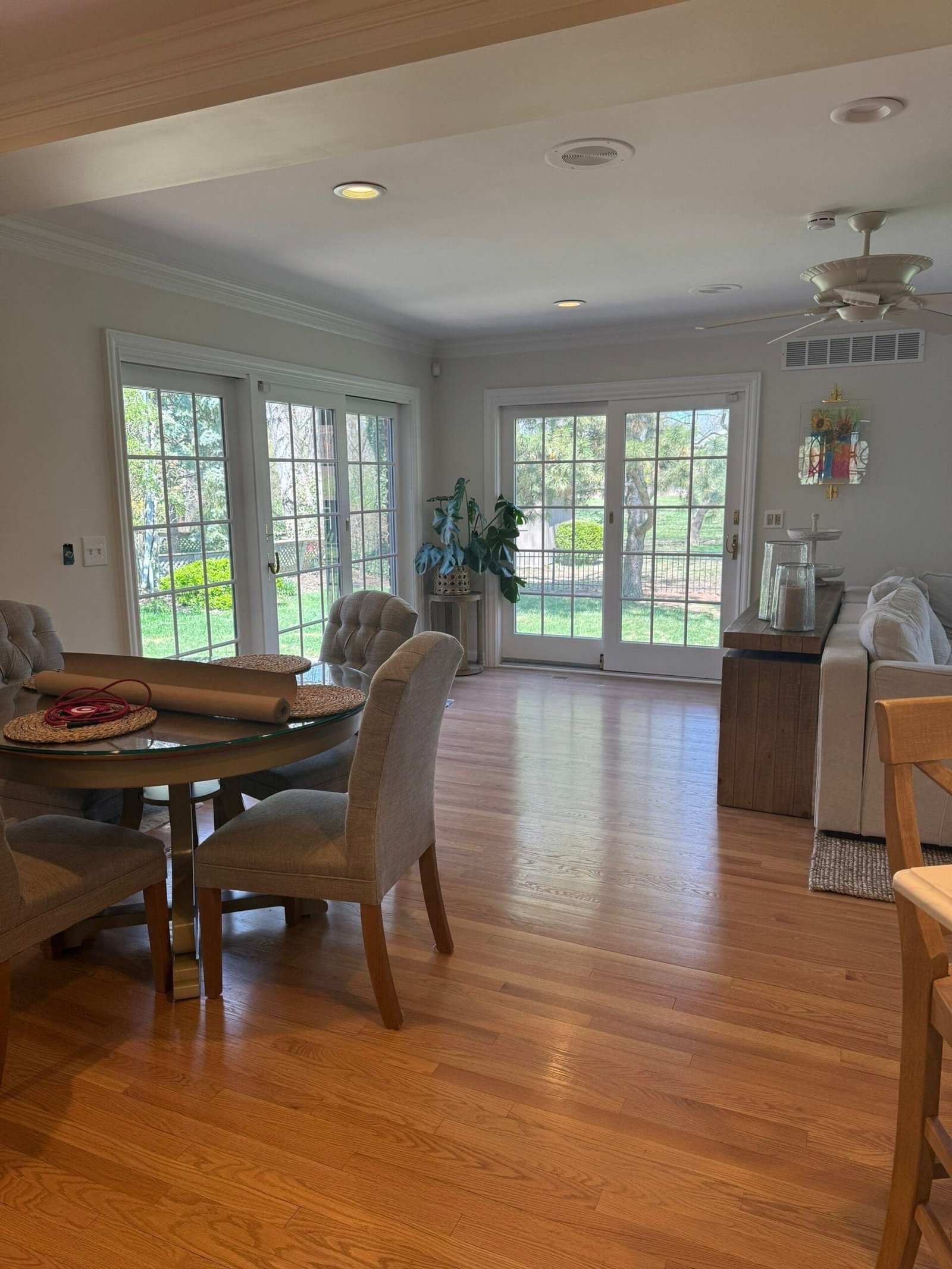 a dining room with a table and chairs