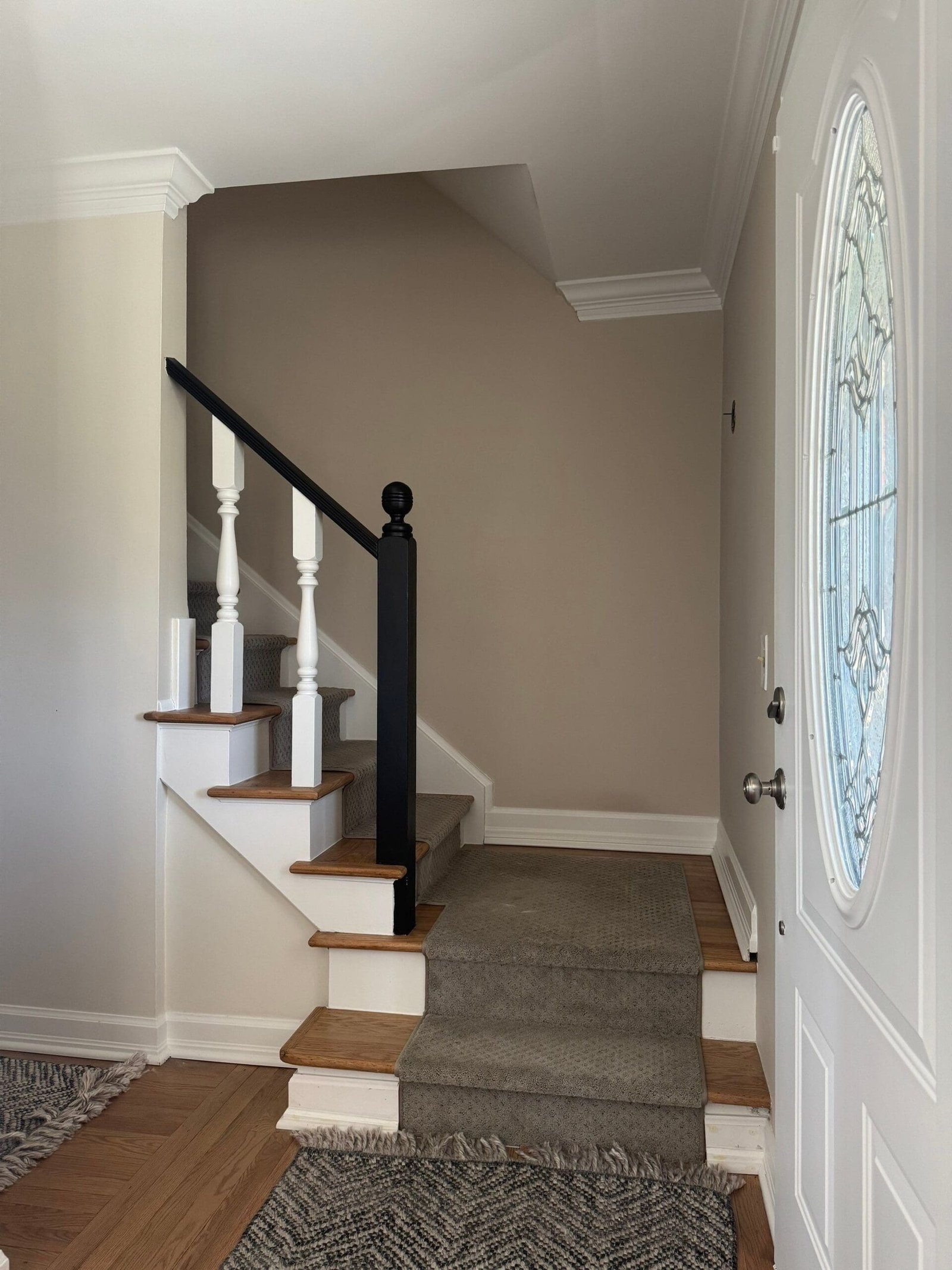 a staircase with carpeted stairs