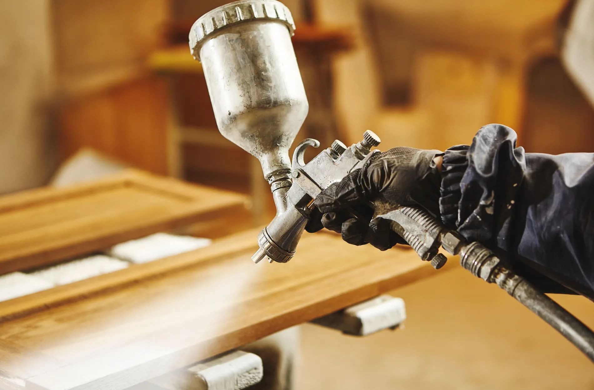 a man cabinets painting