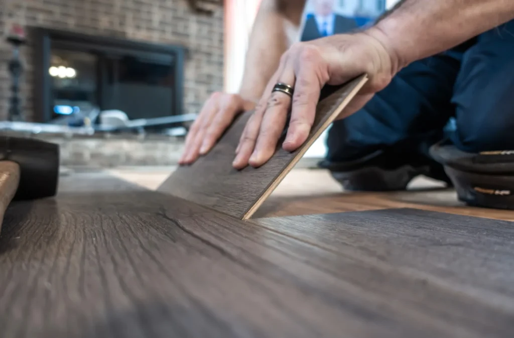 a person using a wood floor