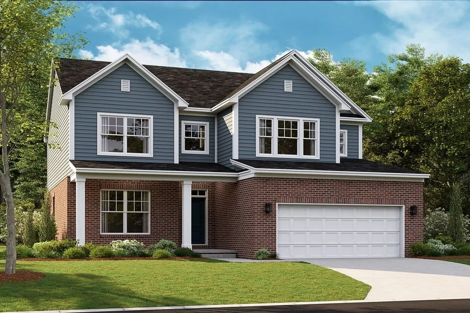 a house with a garage and a lawn