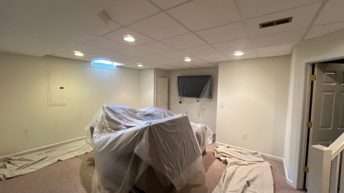 a couch covered in plastic