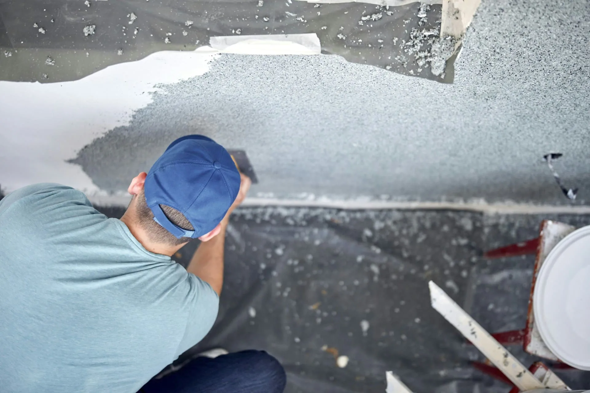 a man painting a wall