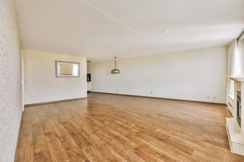 a large room with hardwood floors