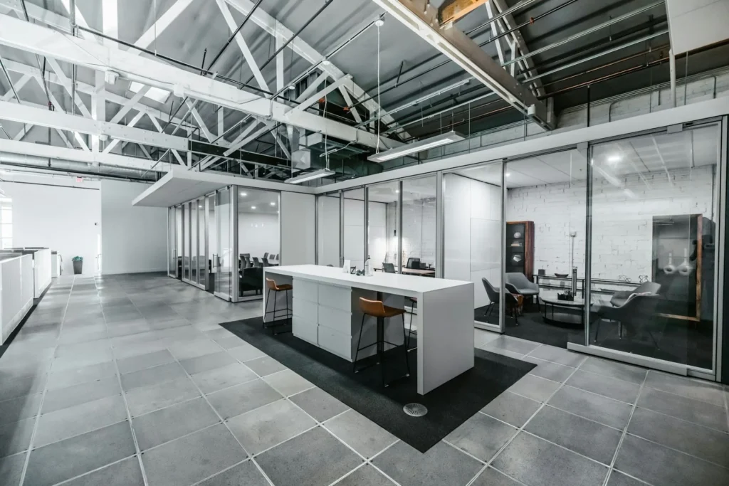 a room with a white table and chairs